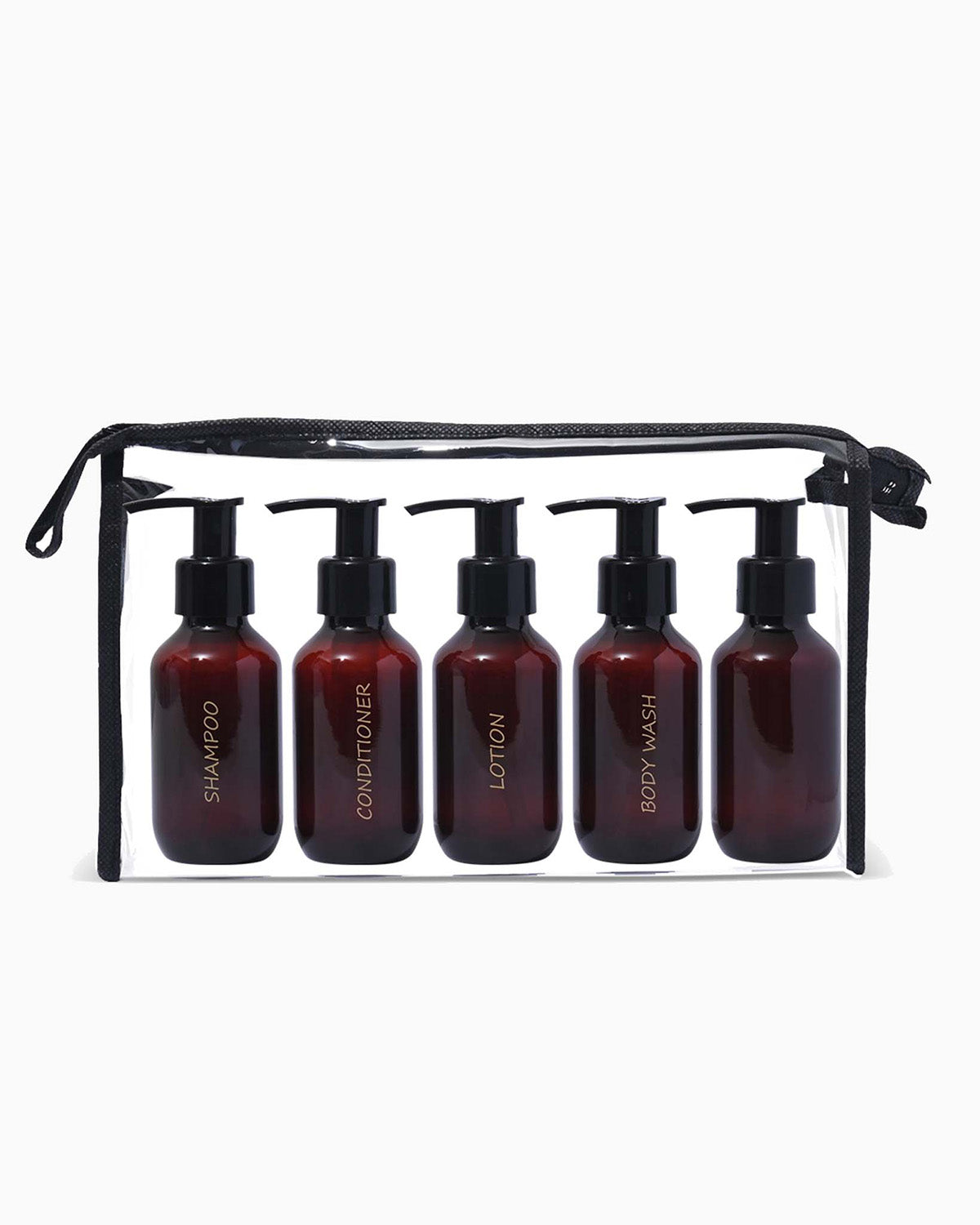 Set of 5 amber bottles with black pumps in a black travel case on a white background