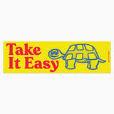 Sticker with a turtle and 'Take It Easy' text on a yellow background