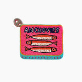 Beaded pouch with 'Anchovies' text and fish illustrations on a pink background