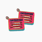 Two pink coasters with fish illustrations and 'Anchovies' text on a white background