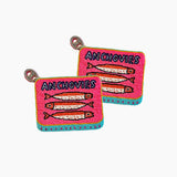 Two pink coasters with fish illustrations and 'Anchovies' text on a white background