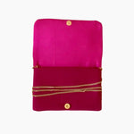 Pink clutch bag with gold chain and buttons on a white background