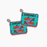 Pair of beaded earrings shaped like sardine tins with colorful fish illustration on a white background