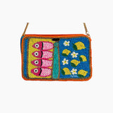 Colorful beaded purse with fish and floral design on a white background
