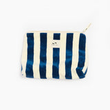 Blue and white striped pouch with a brand logo on a white background