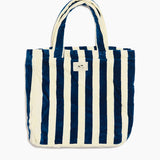 Blue and white striped tote bag on a white background