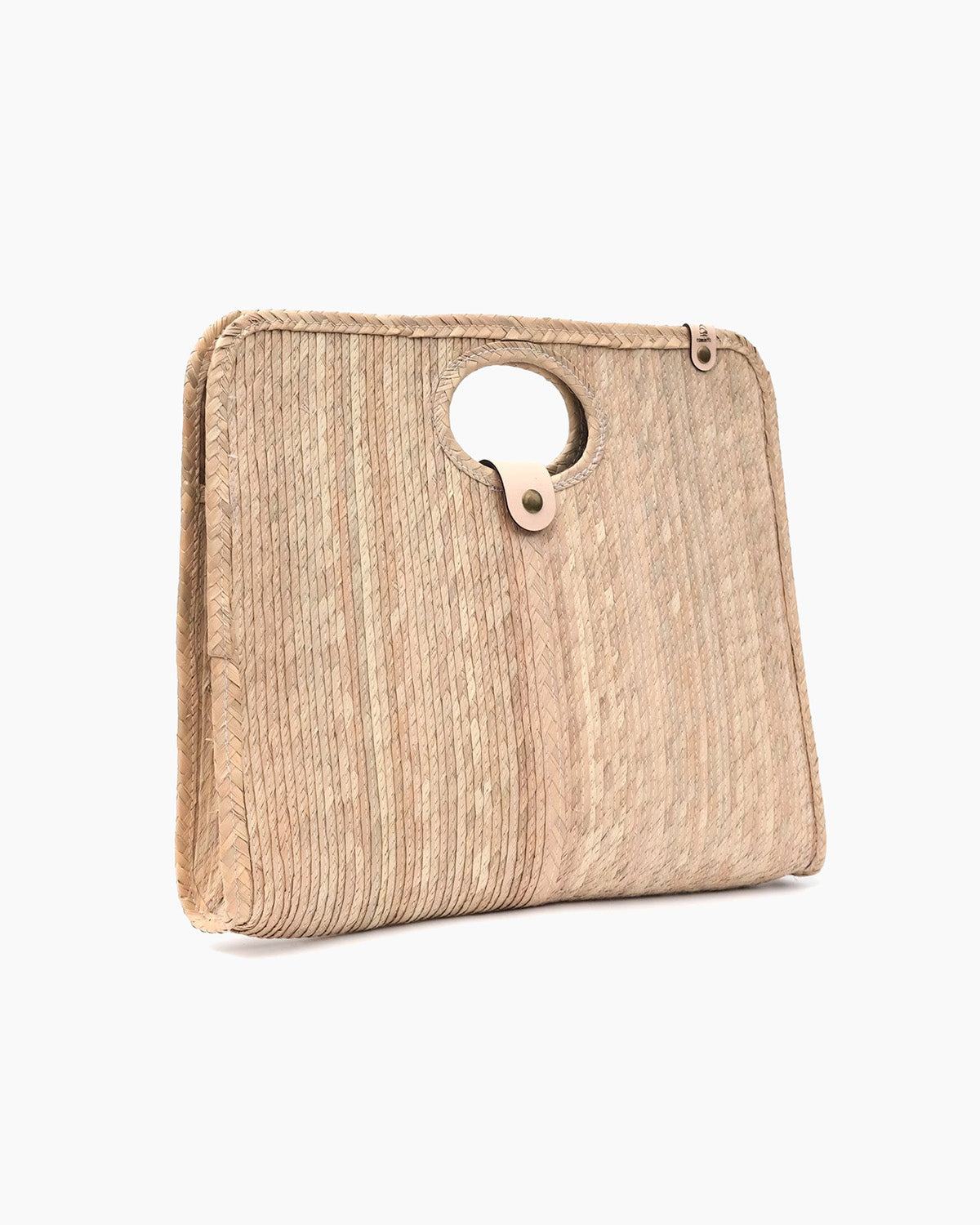 Palm fiber woven tan bag angled on a white background