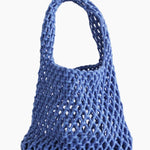 Blue mesh bag on a light background