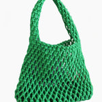 Green mesh bag on a light background