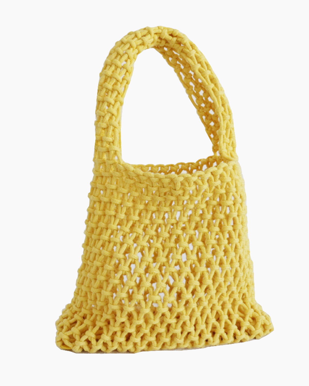 Yellow mesh bag on a light background