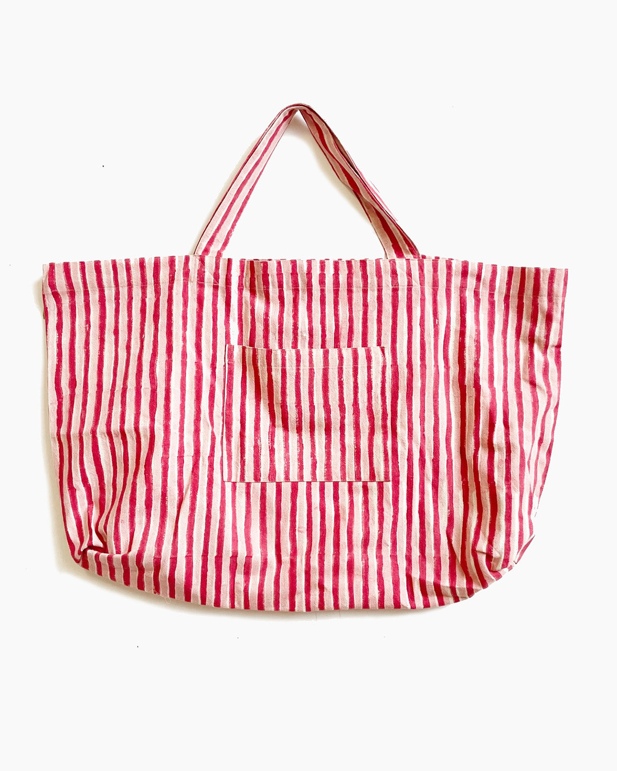 Red and white striped tote bag on a white background