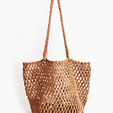 Woven brown bag on a white background