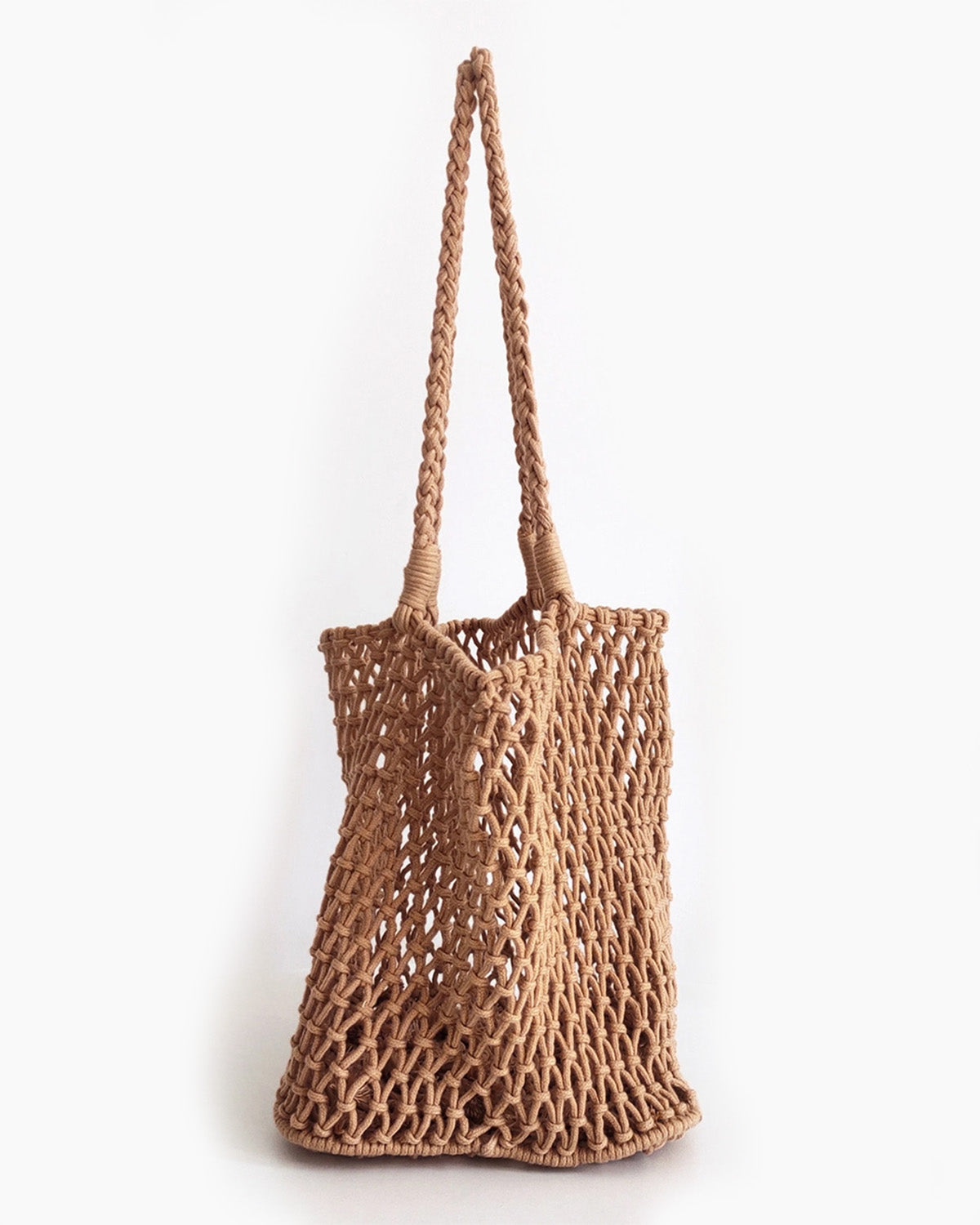 Brown woven bag on a white background