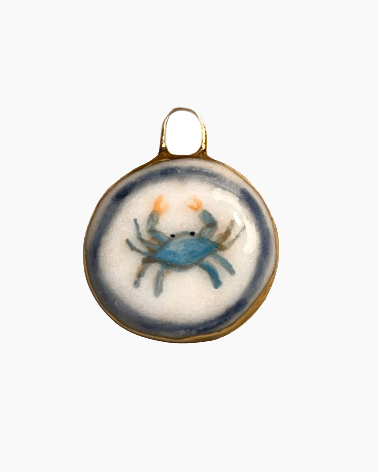 Decorative pendant with a blue crab design on a white background