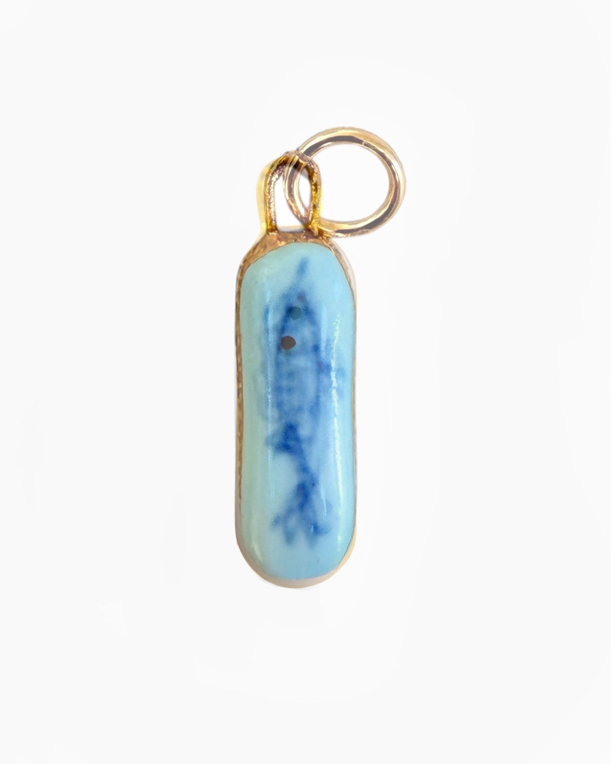 Blue and white pendant with gold chain on a white background