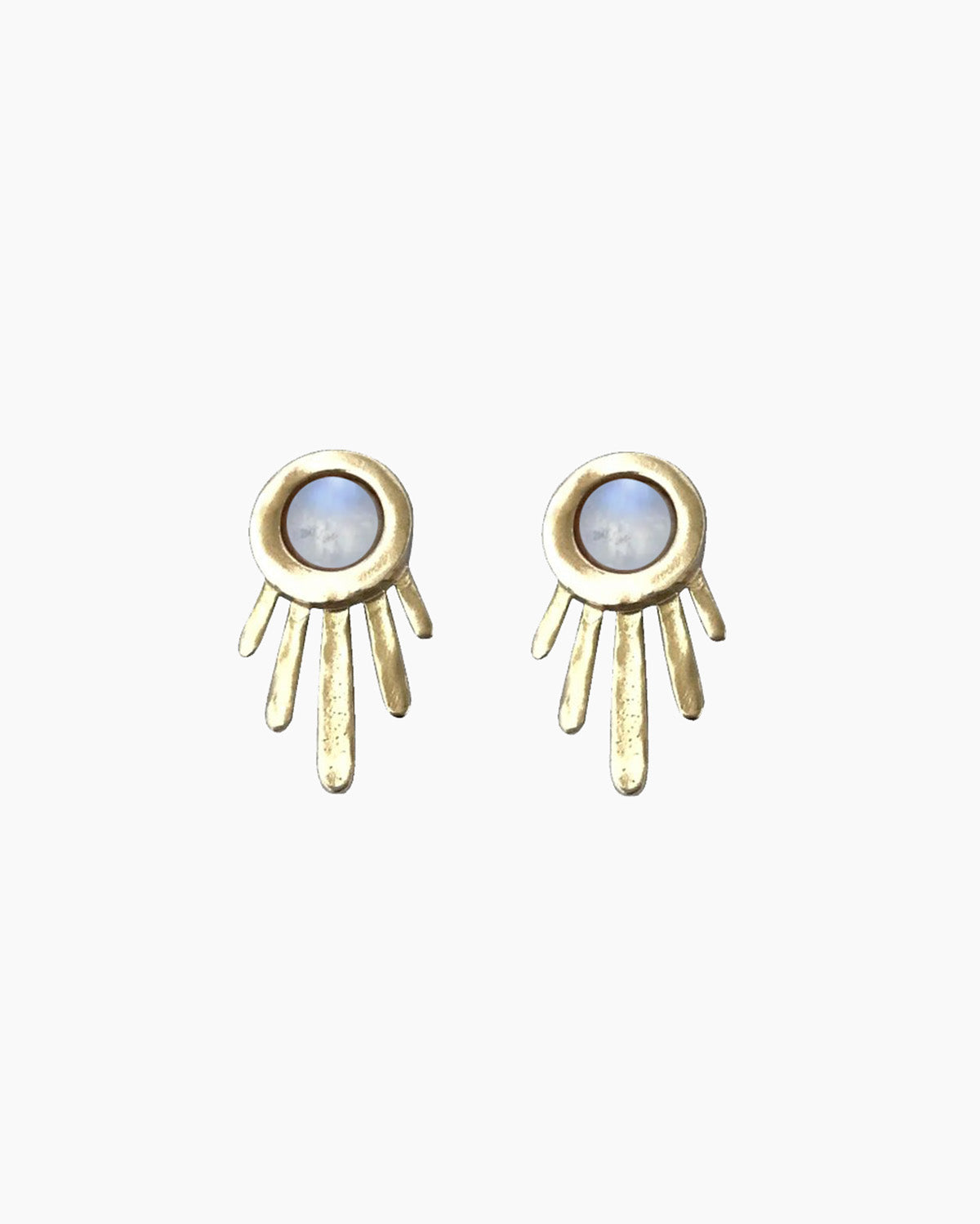 Gold sun-shaped earrings with gemstones on a white background