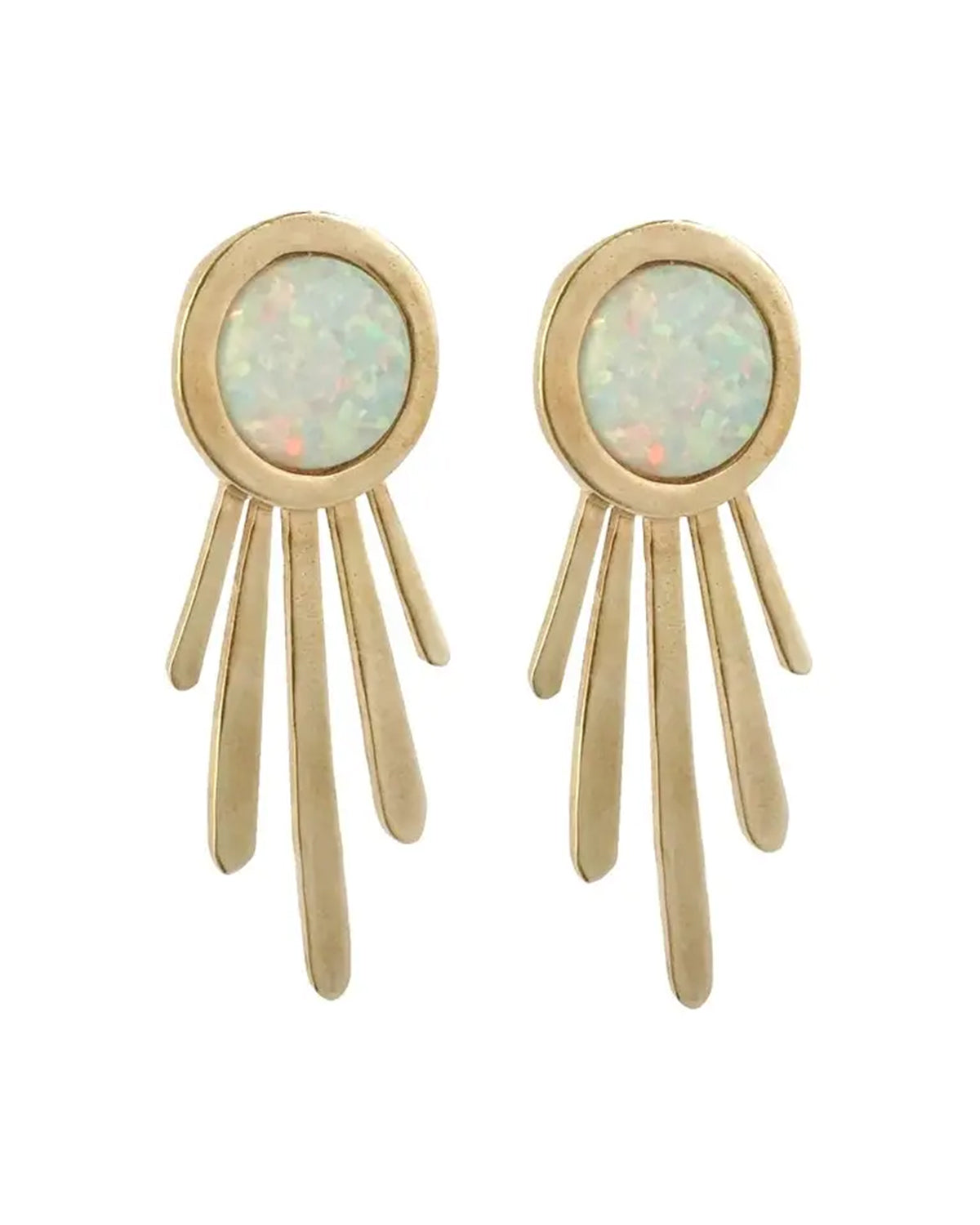 Gold earrings with opal stones on a white background