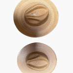 Two sizes overhead of Explorer Fine Palm Hat Toasted Flat Brim on white background