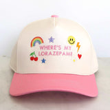 Beige cap with pink visor featuring colorful graphics and text on a light background