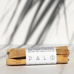 Palo Santo sticks wrapped in paper with 'Palo' branding on a white background