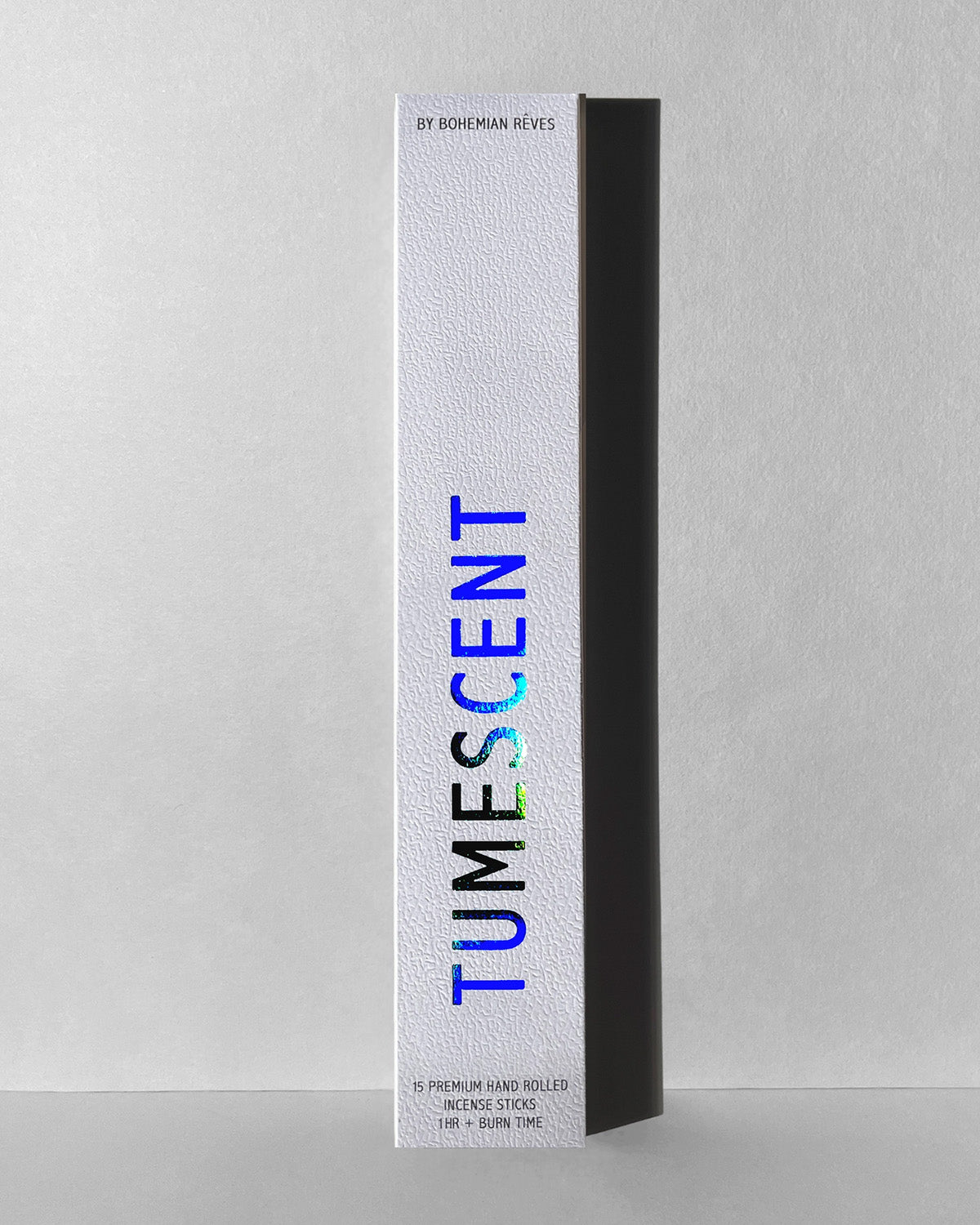 Tumescent packaging with colorful text on a gray background