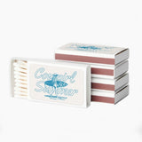 Stack of matches with 'Cowgirl Summer' design on a white background