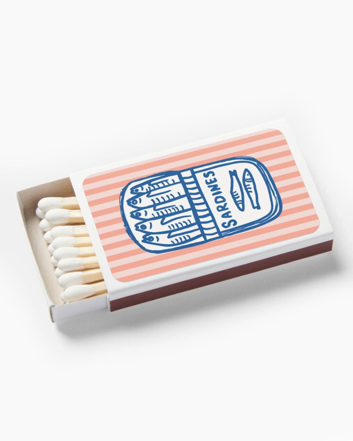 Matchbox with striped design and 'Sardines' label on a white background