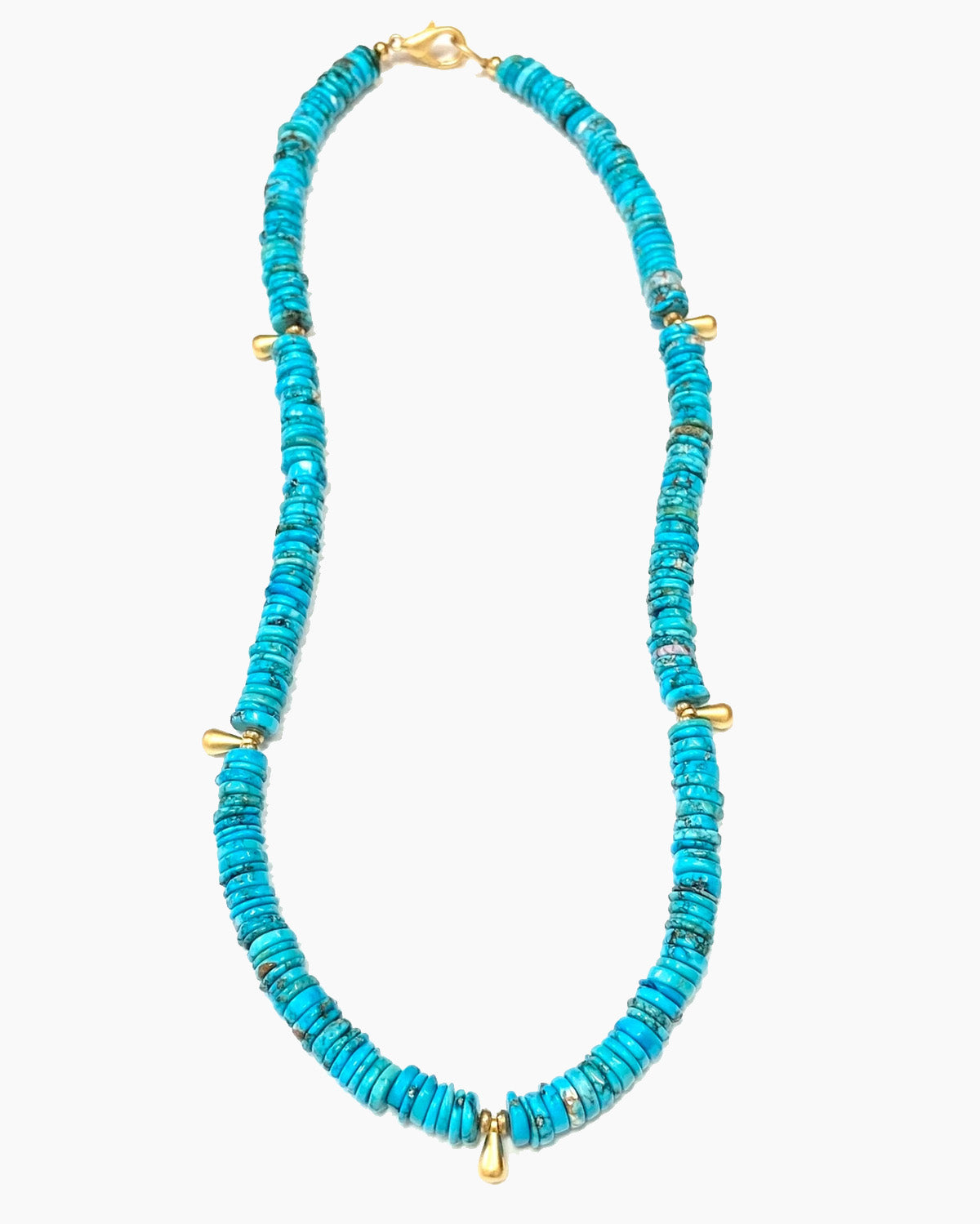 Turquoise beaded necklace with gold accents on a white background