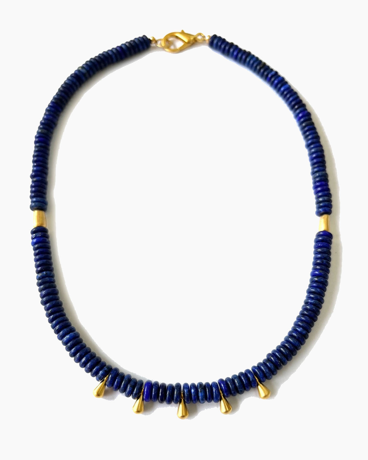 Blue beaded necklace with gold accents on a white background