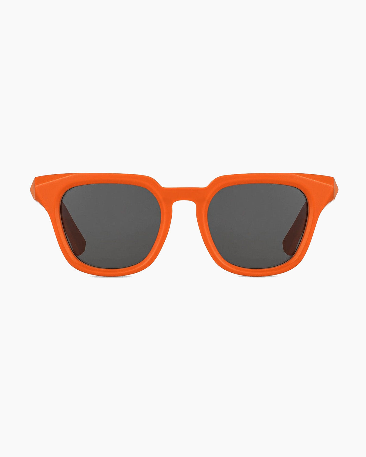 Orange sunglasses with dark lenses on a white background