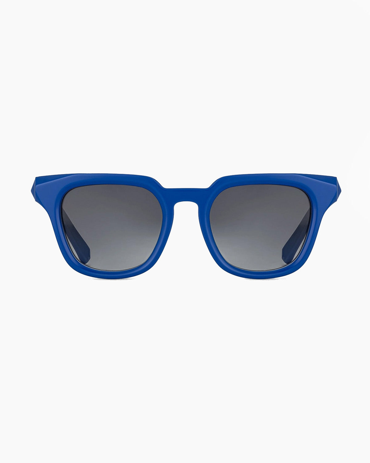 Blue sunglasses with gradient lenses on a white background