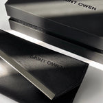 Black leather wallet with 'SAINT OWEN' branding on a white background