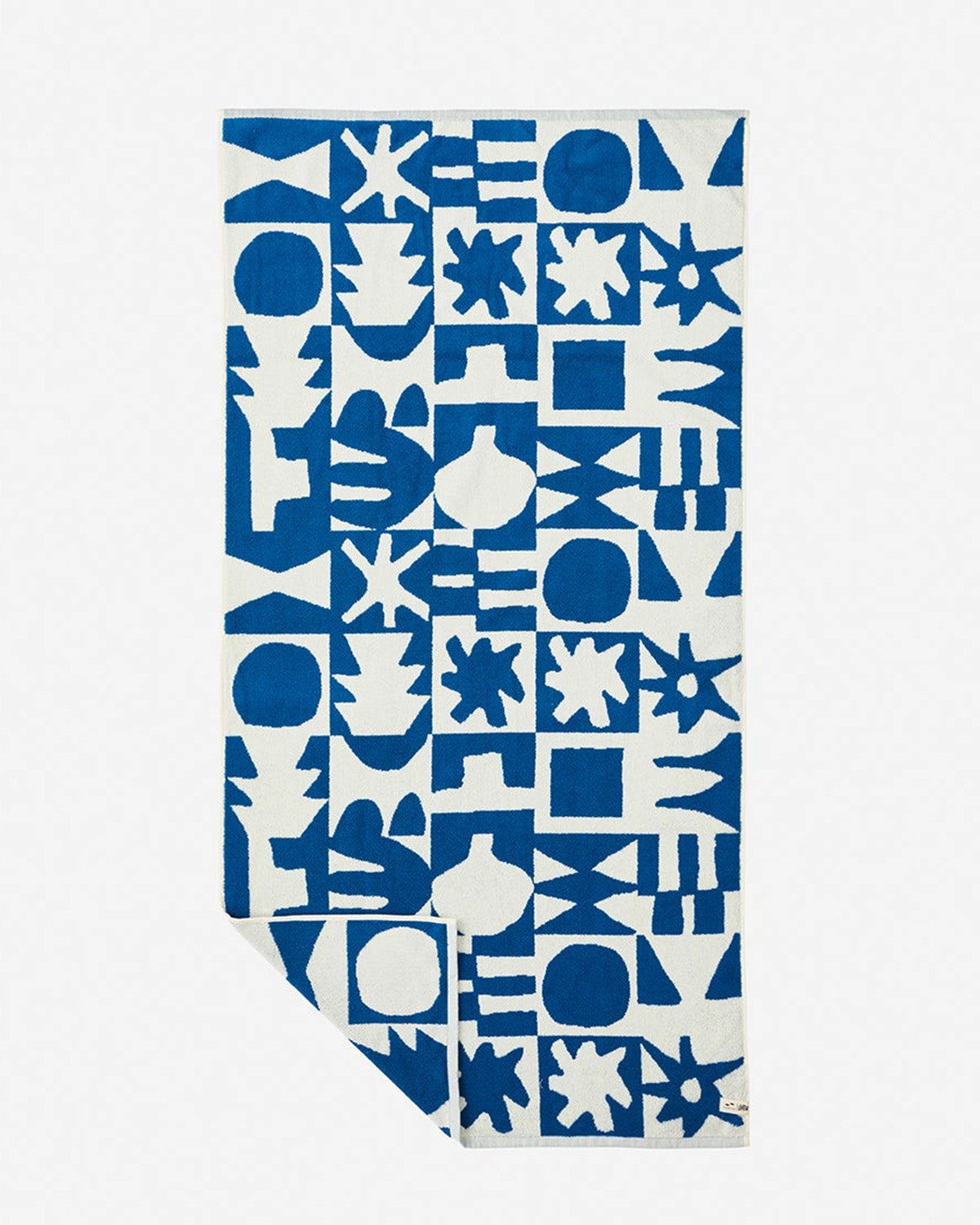 Blue and white patterned towel on a white background