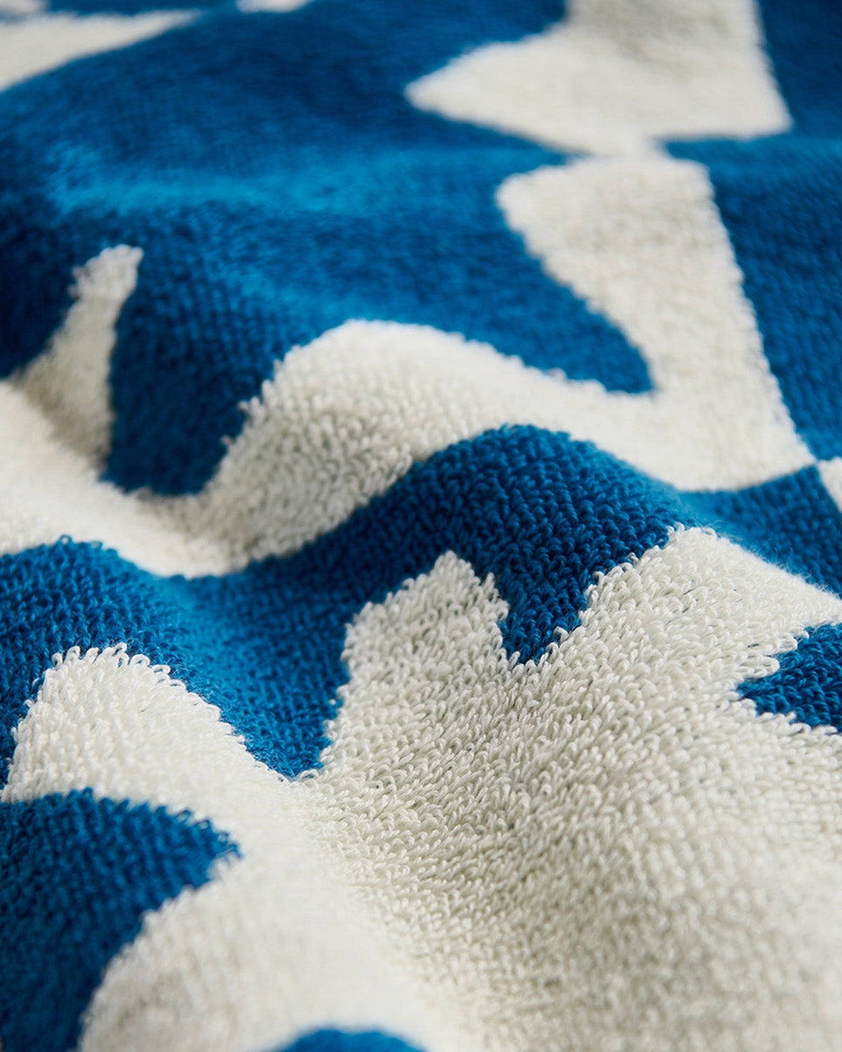 Close-up of a blue and white patterned fabric