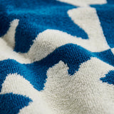 Close-up of a blue and white patterned fabric